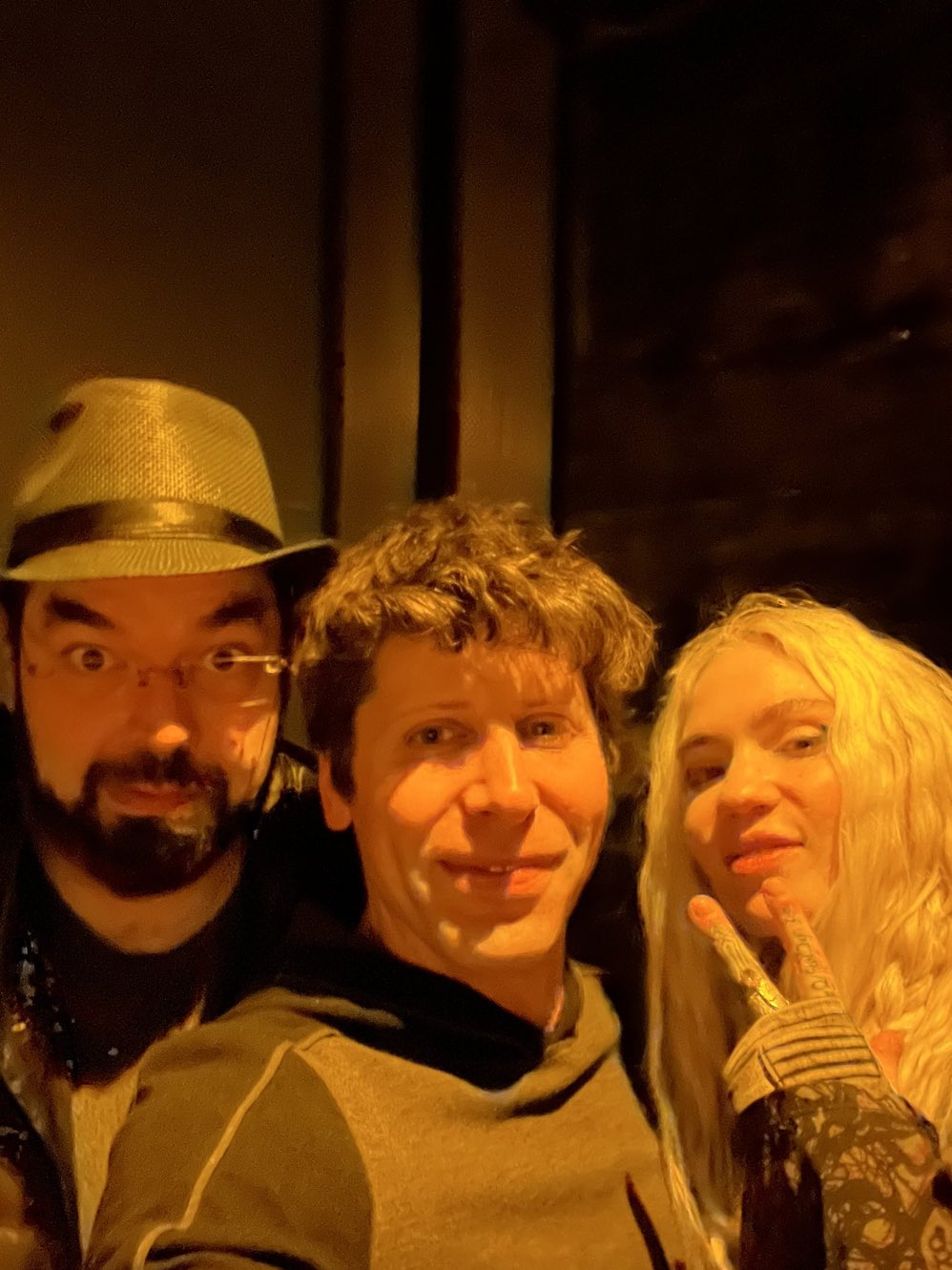 Eliezer Yudkowsky (AI-alignment theorist) + Sam Altman (co-founder of OpenAI) + Grimes